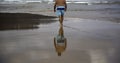 Person walking beach Royalty Free Stock Photo