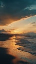 Person Walking on Beach at Sunset Royalty Free Stock Photo