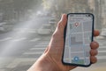 person with navigation app on city street