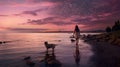 person walking with dog at beach at sunset, woman play with pet at nature, silhouette of female and animal playing Royalty Free Stock Photo