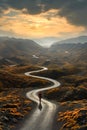 A person walking down a winding road with curves in the middle of a mountain Royalty Free Stock Photo