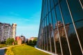 Person walking in front of skyscraper in the Citylife district of Milan