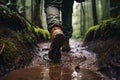 Person Walking on Muddy Path in the Woods