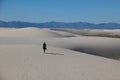 Person walking on white sand dunes, White Sands National Monument, New Mexico, USA Royalty Free Stock Photo