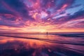 A person walks along the sandy beach, against the backdrop of a vibrant sunset, Vibrant, multicolored sunset over the ocean with a Royalty Free Stock Photo