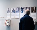 A person walks through an exhibition at the Australian War Memorial