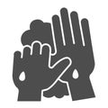 Person washing hands with soap and water solid icon. Proper clean fingers hygiene covid-19 glyph style pictogram on