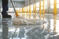 Person Cleaning Floor With Mop Royalty Free Stock Photo