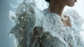 A person wearing a 3D printed dress made from a flexible rubberlike material. The dress is intricately detailed and has