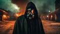 A person wearing a gas mask and a hooded cloak, standing in front of a burning city.