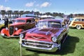 Outstanding maroon 1957 Chevy At Dr. George Car Show Royalty Free Stock Photo