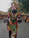 a person who wears traditional Dayak clothes for carnival