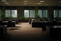 a person working alone in an empty office, after everyone else has gone home Royalty Free Stock Photo