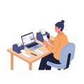 Person working at desk with laptop and printers Royalty Free Stock Photo