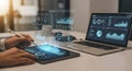 Person working with digital tablet and laptop displaying data analysis and business intelligence dashboards Royalty Free Stock Photo