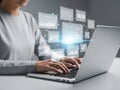 Person working on laptop with data visualization and analytics interface Royalty Free Stock Photo