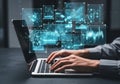 Person working on laptop with futuristic data visualization overlay Royalty Free Stock Photo