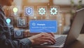 Person working on laptop interacting with artificial intelligence and prompts for cognitive computing Royalty Free Stock Photo