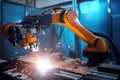 person, working with robotic arm and welding torch, repairing factory machine