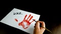 a person writes stop war on white paper. bloody hand palm print Royalty Free Stock Photo