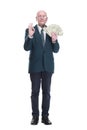 personable business man with a wad of dollar bills Royalty Free Stock Photo