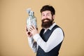 Personal accountant. Businessman with his dollar savings. Richness and wellbeing. Man bearded guy hold jar full of cash Royalty Free Stock Photo