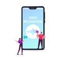 Personal Assistant and Voice Recognition Concept Tiny Characters at Huge Mobile Phone with Sound Symbol Royalty Free Stock Photo
