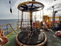 Personal basket for lifting personel from boat to platform Or vice versa on the morning view