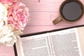 Personal Bible Study with a Cup of Coffee on a Pink Table Royalty Free Stock Photo