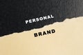 Personal brand words on torn paper Royalty Free Stock Photo