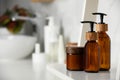 Different personal care products on shelf in bathroom. Space for text Royalty Free Stock Photo