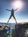 Personal challenge, risk and freedom. Crazy man jumping over