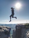 Personal challenge, risk and freedom. Crazy man jumping over