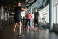 Personal crossfit training for mature couple at gym Royalty Free Stock Photo