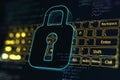 Personal data security and cyber protection concept with dark digital pad lock symbol with key hole on yellow keyboard background Royalty Free Stock Photo