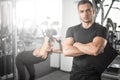 Personal fitness trainer with his client in gym. Royalty Free Stock Photo