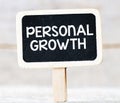 PERSONAL GROWTH words on a small chalkboard Royalty Free Stock Photo