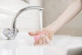 personal hygiene rules, person with a soap brick piece and wash his dirty hands, coronavirus covid protection Royalty Free Stock Photo