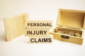 Personal injury claims symbol. Concept words TSA, tax sheltered annuary on wooden blocks