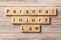 Personal injury law word written on wood block. personal injury law text on table, concept Royalty Free Stock Photo