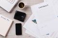 Personal items, americano and contract. Royalty Free Stock Photo