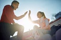 Personal male trainer giving high five to young adult female, satisfied after good training Royalty Free Stock Photo