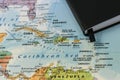 Personal notes of someone planning a trip to the caribbean sea over a closeup map of Cuba, Haiti, Jamaica, Dominican Royalty Free Stock Photo
