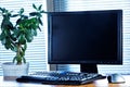 Personal office of a successful office - computer monitor, keyboard, mouse, money tree, blinds on the Windows. Necessary Royalty Free Stock Photo