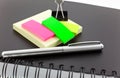 Personal organizer, post-its and steel clip Royalty Free Stock Photo