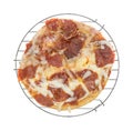 Personal size pepperoni pizza on a wire rack Royalty Free Stock Photo