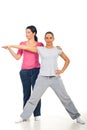 Personal trainer assist woman at fitness Royalty Free Stock Photo