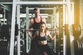 Personal trainer coaching asian woman exercise workout in gym,Concept healthy and lifestyle Royalty Free Stock Photo