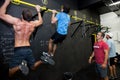 Personal Trainer giving fitness instruction at a Crossfit group class