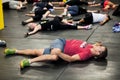 Personal Trainer giving fitness instruction at a Crossfit group class